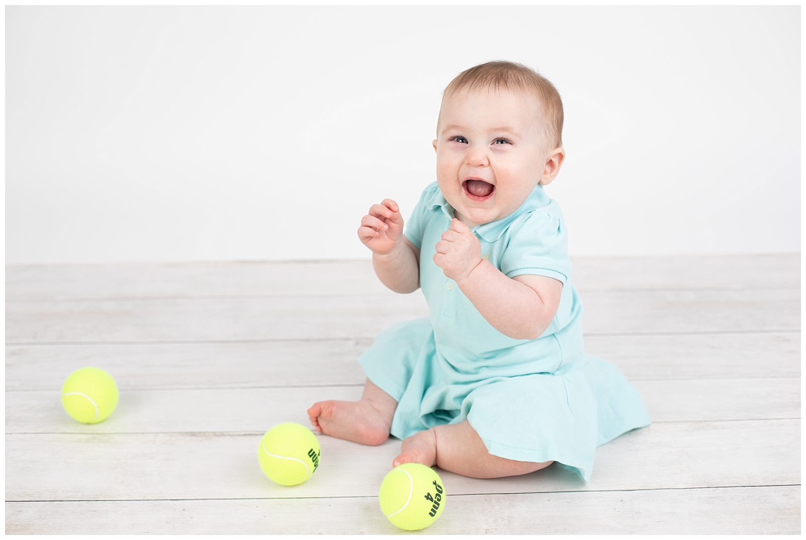 Smiling tennis baby