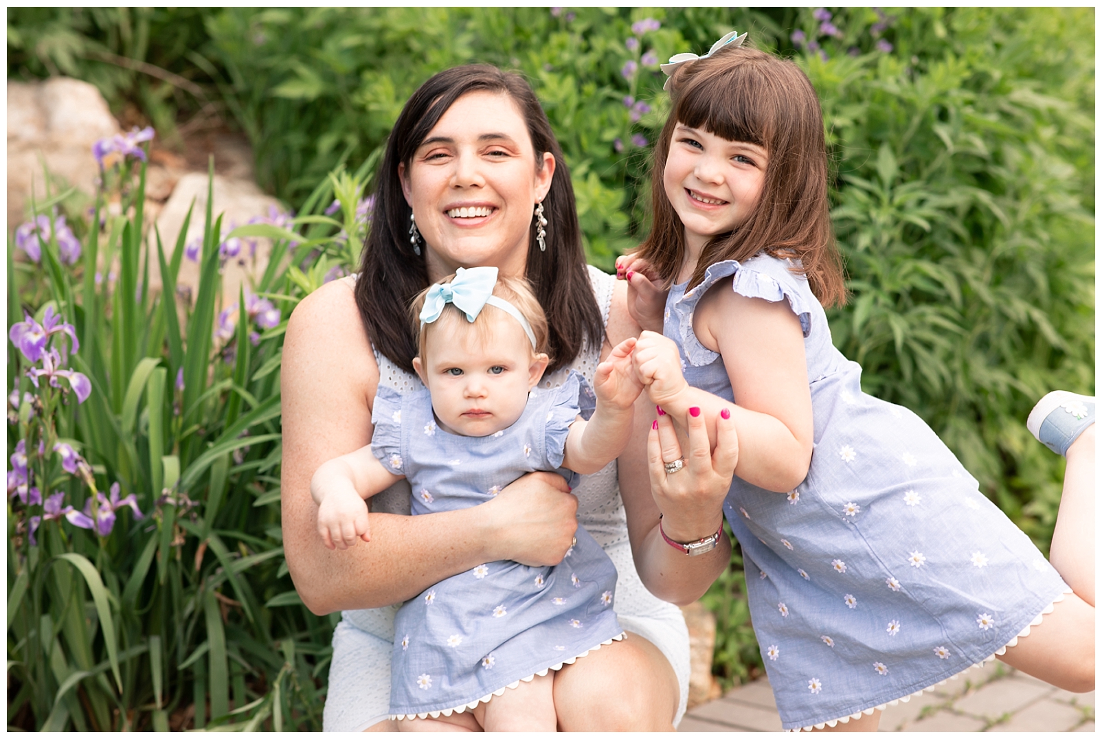 Mother and two daughters with lavender flowers