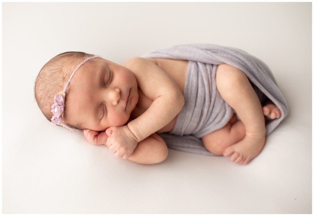 newborn in side lying pose