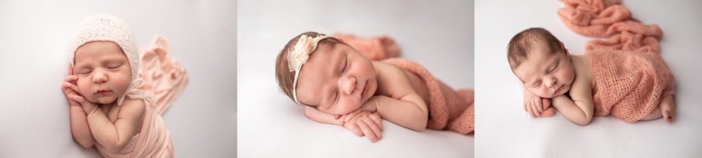 newborn girl posed in peach and pink