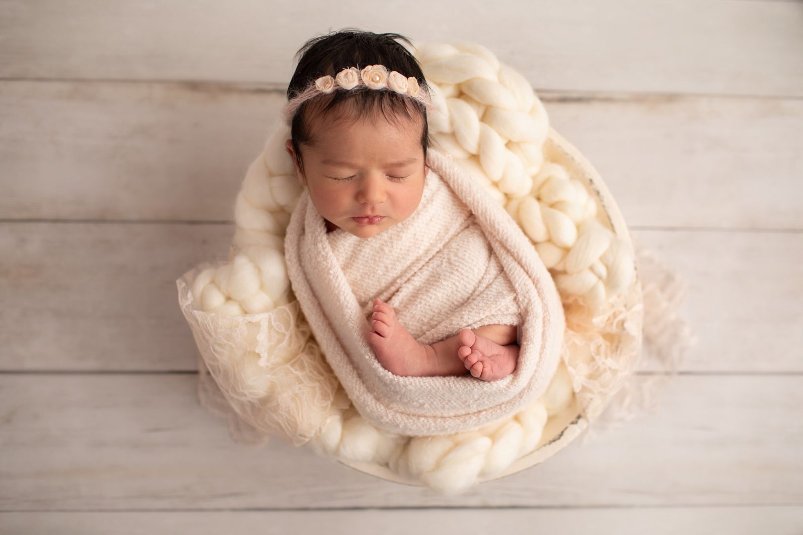 Ellie headband on a newborn baby girl in a bowl made by Rebecca Leigh Studio