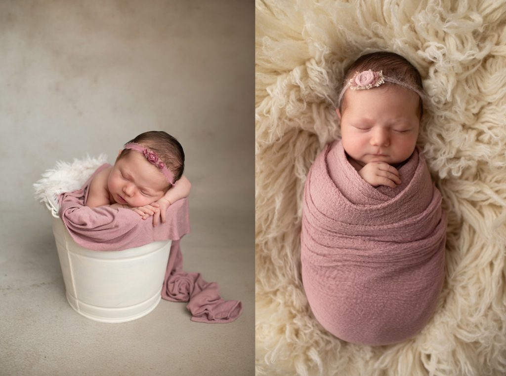Newborn with chin on hands in bucket with a mauve floral headband and newborn in mauve wrap with rose headband on a flokati
