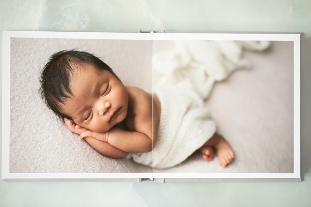newborn portraits in an album