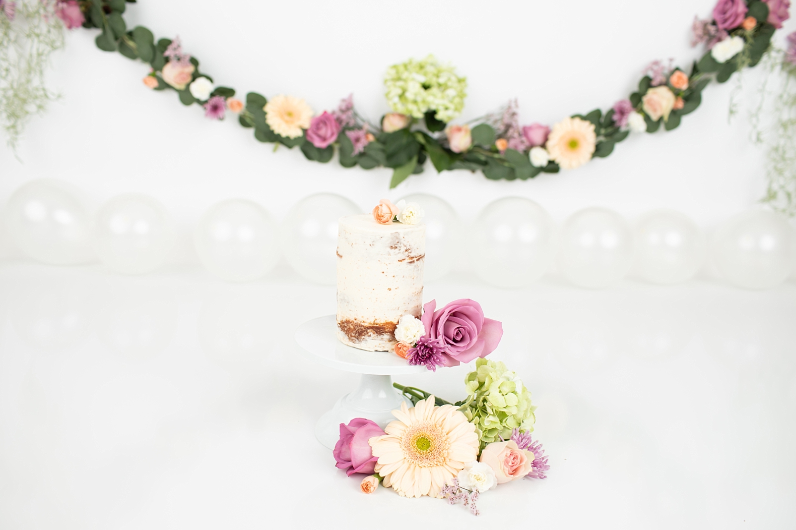 4 tier cake smash cake with fresh flower adornment | How to Choose a Smash Cake
