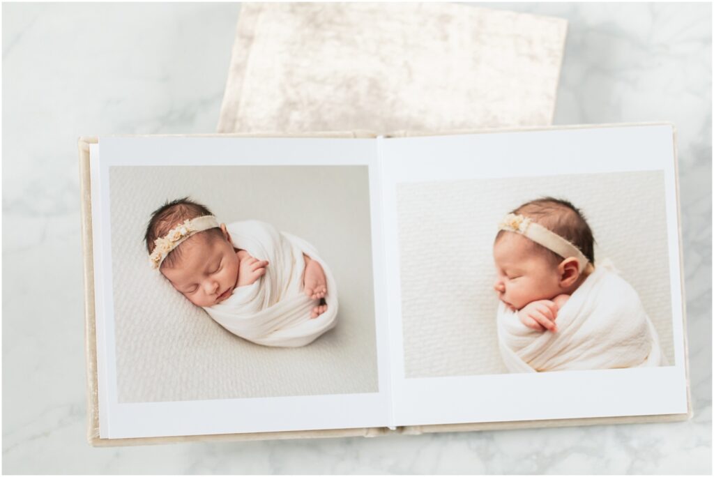 Linen Heirloom Albums | Newborn Photos of a baby swaddled in a cream color wrap and floral headband