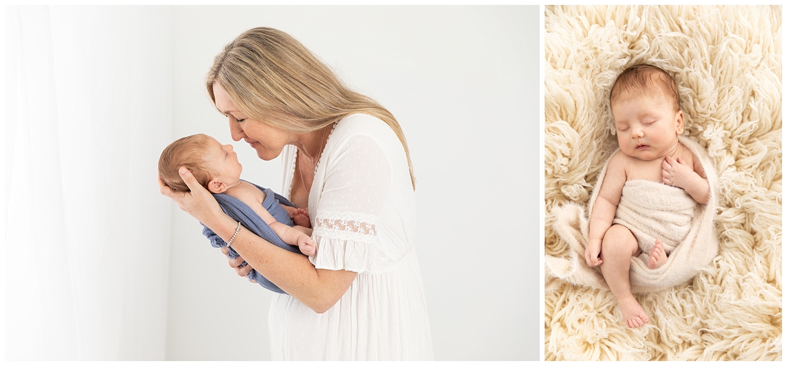 A mom standing in a white dress by a curtain and smiling at her newborn boy wrapped in blue and a newborn boy wrapped in a fuzzy ivory wrap on a flokati